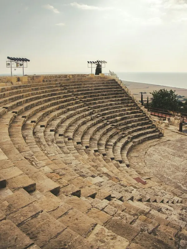Stone seating of the ancient theatre at Kourion above the sea